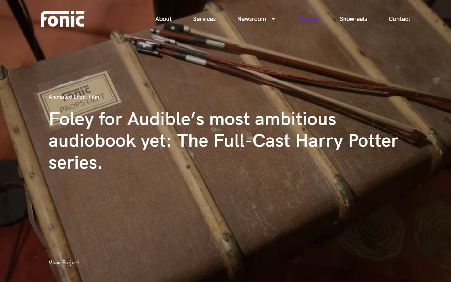 Fonic Projects page header featuring Foley for Audible's Full-Cast Harry Potter audiobooks, over a photo of a vintage props trunk